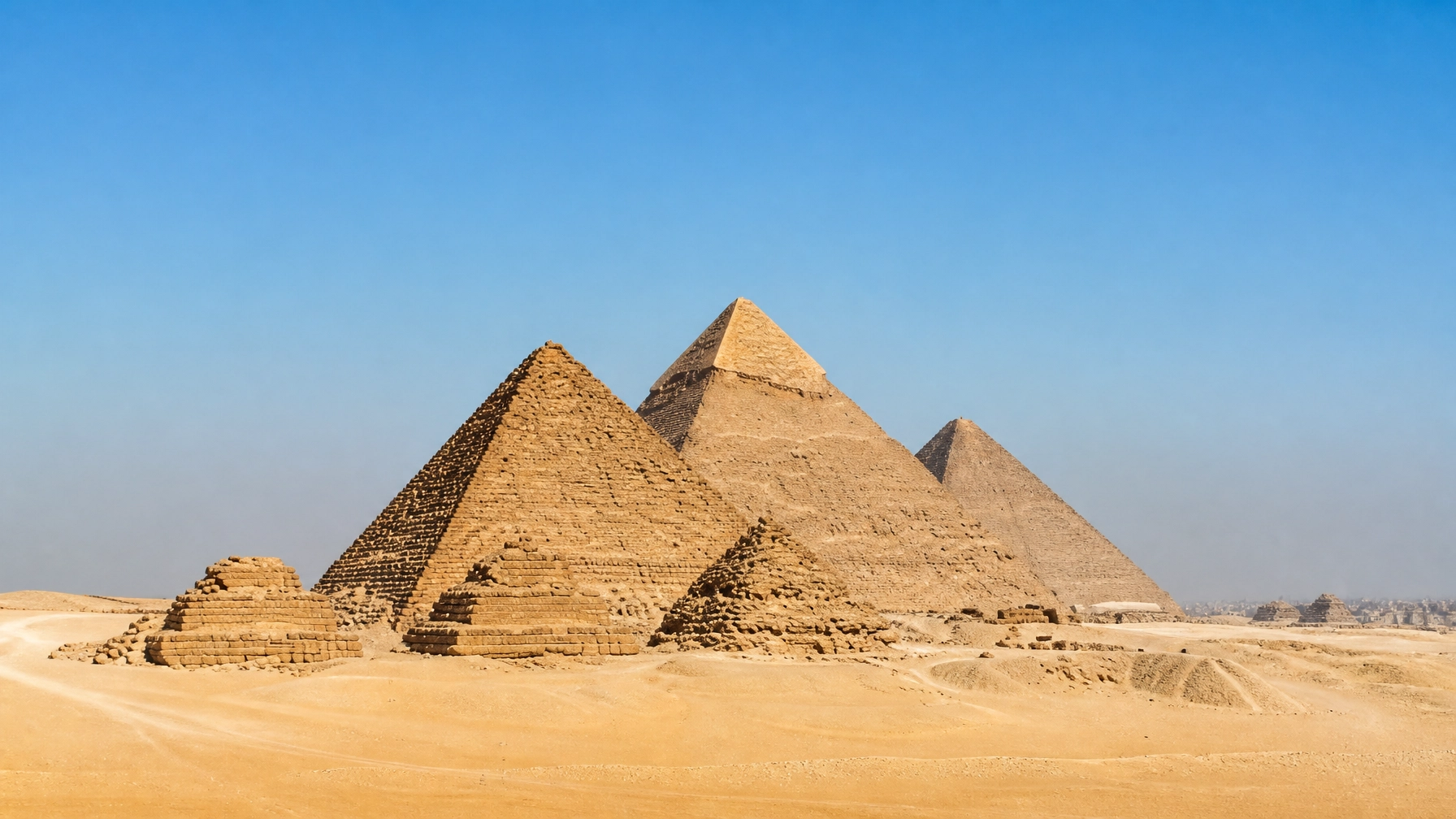 Majestic ancient Egyptian pyramids under a clear blue sky